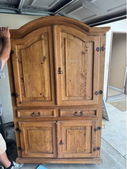 Real hard wood dresser or tv stand has drawers and bottom storage