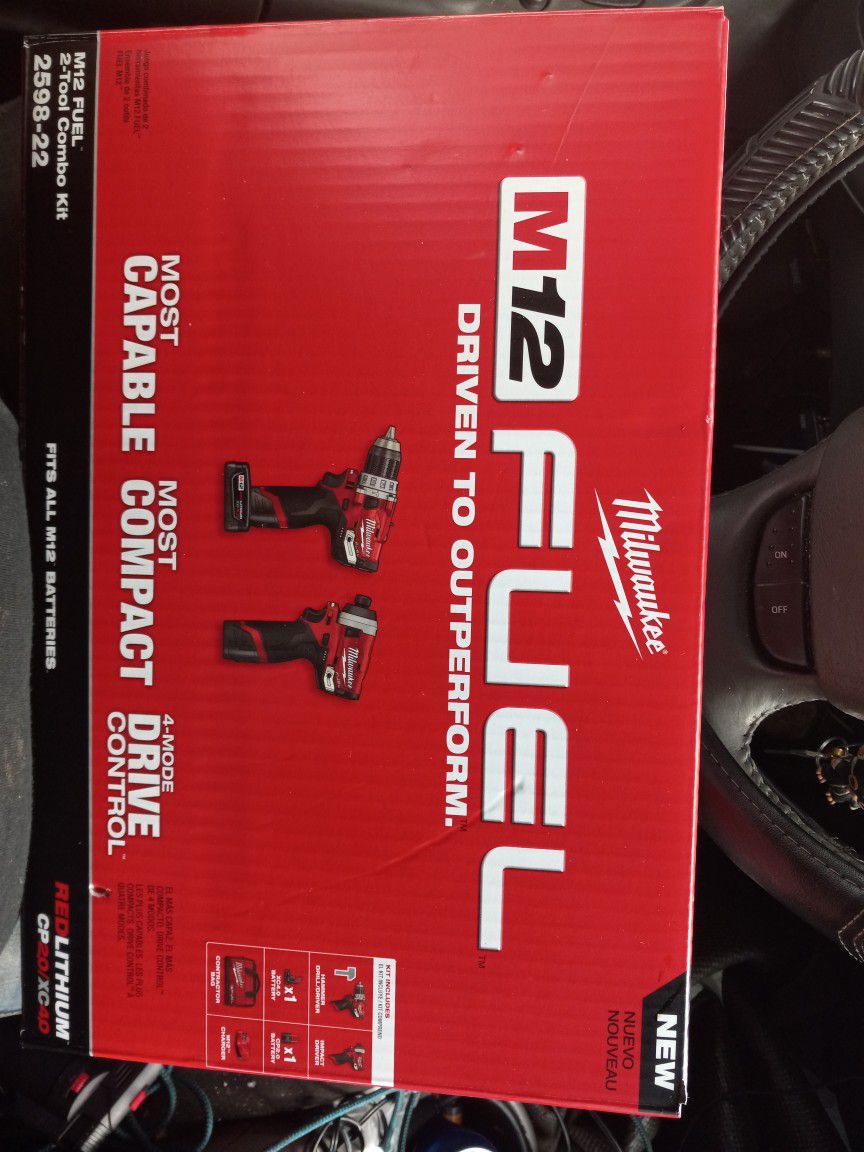 BRAN NEW.  NEVER OPENED. M12. FUEL.  DRILL AN INPACT DOUBLE SET