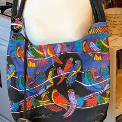 LAUREL BURCH-Shoulder Bag. Bright vivid colors define the signature artwork of artist Laurel Burch. Her totes are designed to be practical and useful 