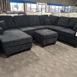 Big Black Sectional And Ottoman 