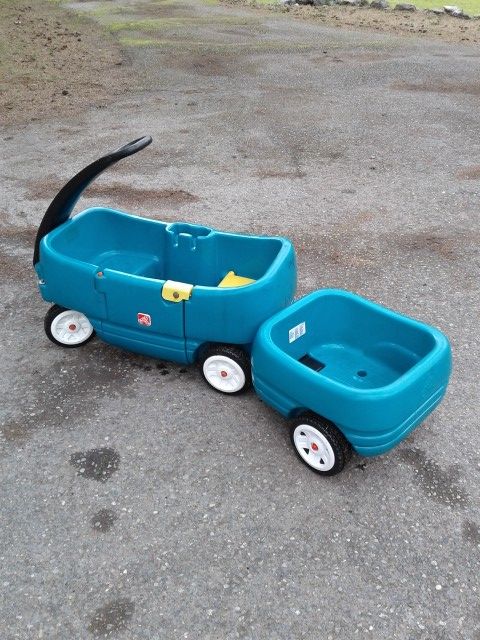 Step 2 Wagon with choo choo wagon trailer.