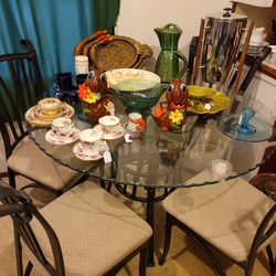 Excellent round top glass kitchen table and chairs