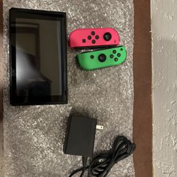 Brand New Pink And Green Nintendo Switch 