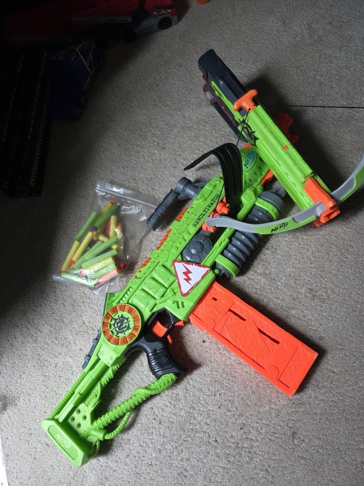 Nerf Zombie Strike Crossfire Bow Blaster And Zombie Strike Revoltinator Blaster.