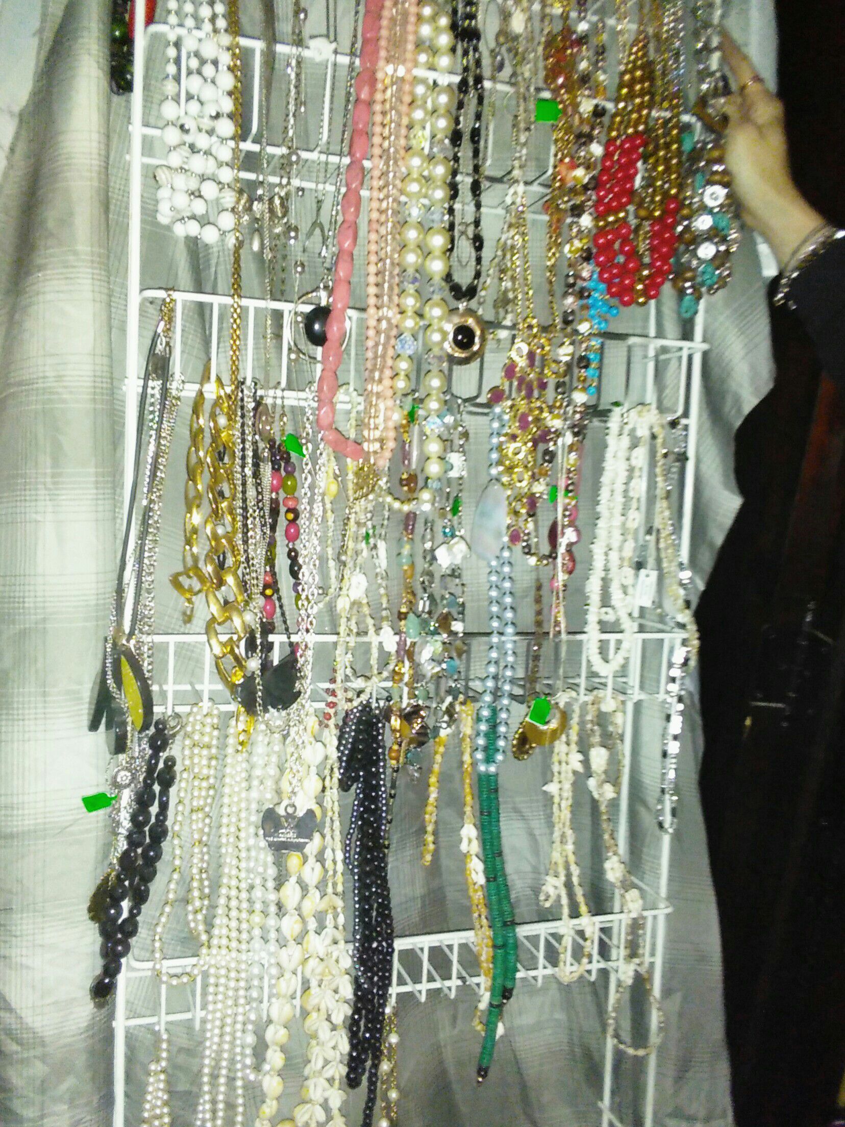 A WHOLE RACK ASSORTED COSTUME JEWELRY