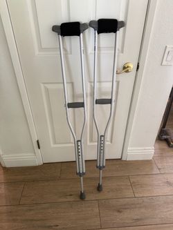 Crutches with arm pads