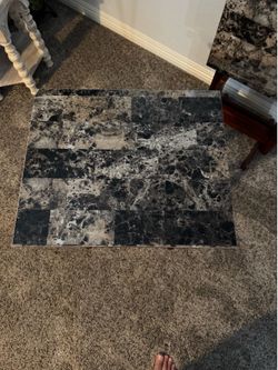 Set of 4 TV trays and storage rack.
