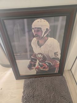 Number five Dennis pod for New York Islanders Hall of Famer autographed centerfold picture it's