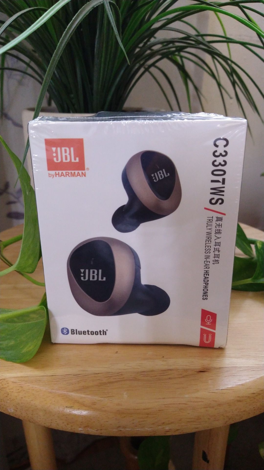 JBL wireless earbuds.