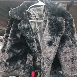 Women's jacket, used but in good condition, for $20.