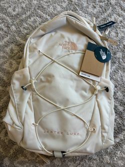 The North Face Luxe Backpack in Cream with Rose-Gold Accents