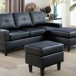 Brand New Black Leather Sectional With A Reversible Chaise& Matching Footrest 