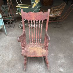 Antique children’s spindle rocking chair