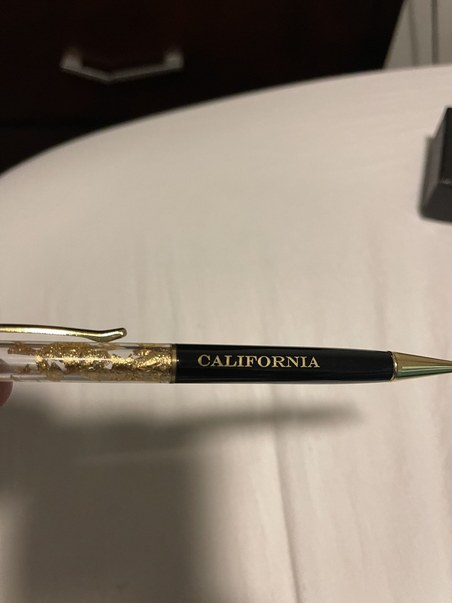 Pen With gold flakes