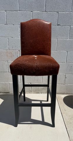 Custom barstool with cowhide seat