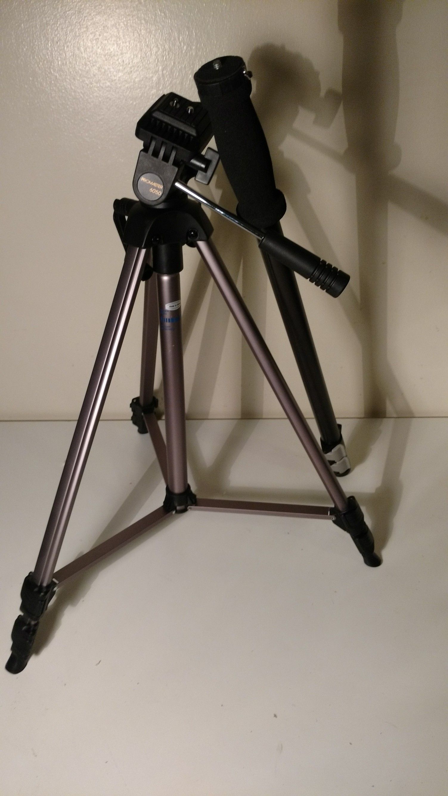 ProMaster brand monopod and tripod set for digital film and video cameras