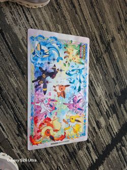 Rare prismatic evolutions eevee playmat.
