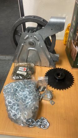 Roll up door hoist