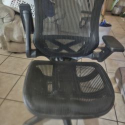 Ventilated Office Chair. It's Adjustable And BRAND New