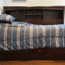 twin size bed with the mattress, 2 drawer , lights, and bed cover