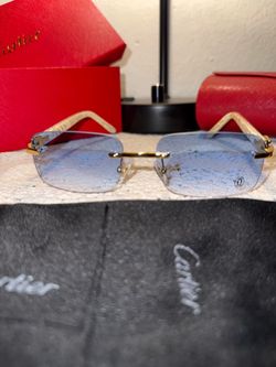 Luxury sunglasses (Cartier Buffs)