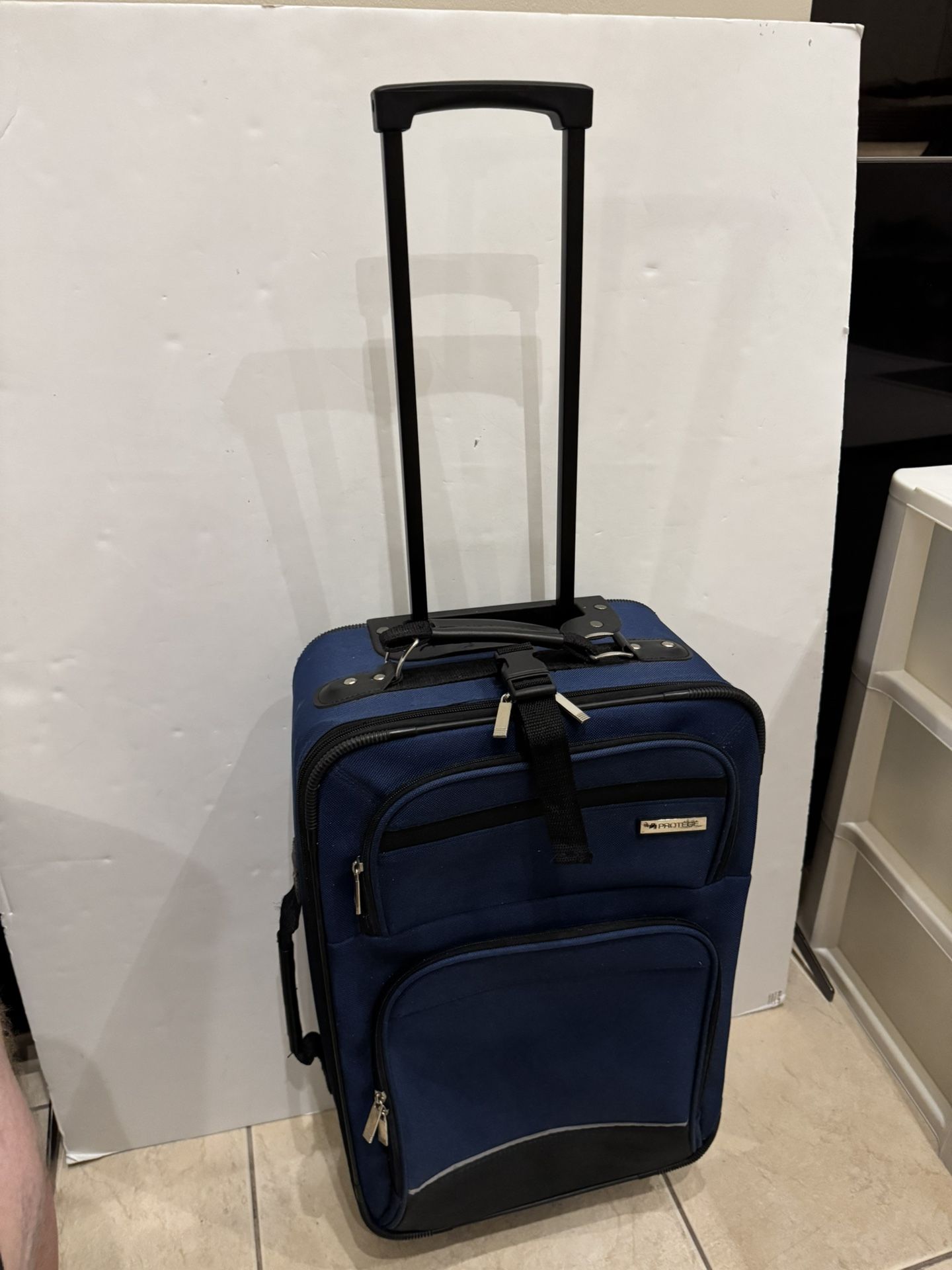 Carry-on Suitcase 22 1/4” Tall 