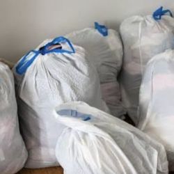 8 bags of women’s clothes dress shirts not free!! Asking 100$