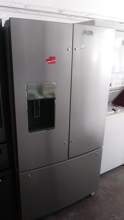 New whirlpool scratch n dent french refrigerator.