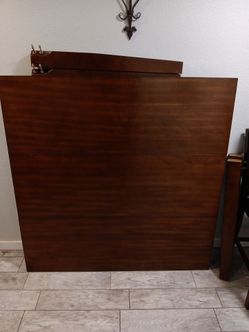 54" BY 54" WOODEN TABLE