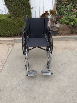 Standard Manual Wheelchair with Footrests