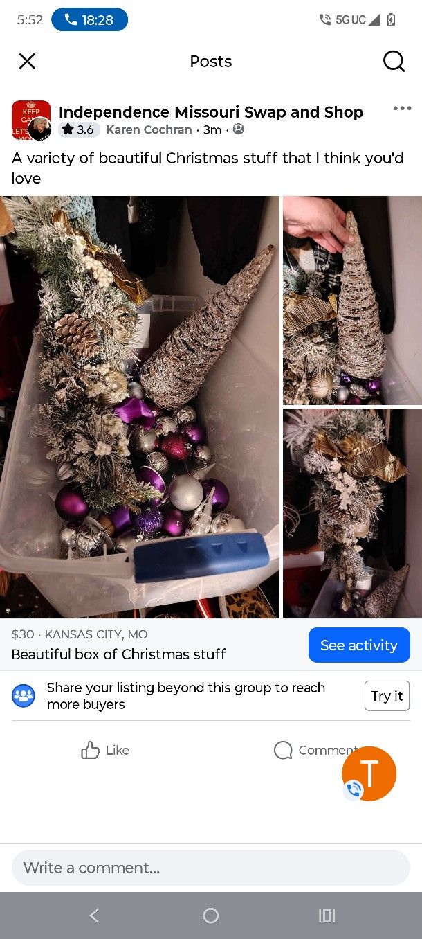 Box Of Christmas Decor And Small Silver Tree And Wreath