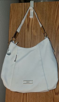 DKNY bag 2 small stains, right corner