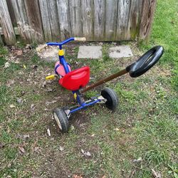 A Beautiful Tricycle With A Long Handle To Gide The Child (NO SHIPPING)