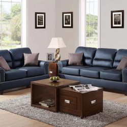 BLACK FAUX LEATHER SOFA AND LOVESEAT 