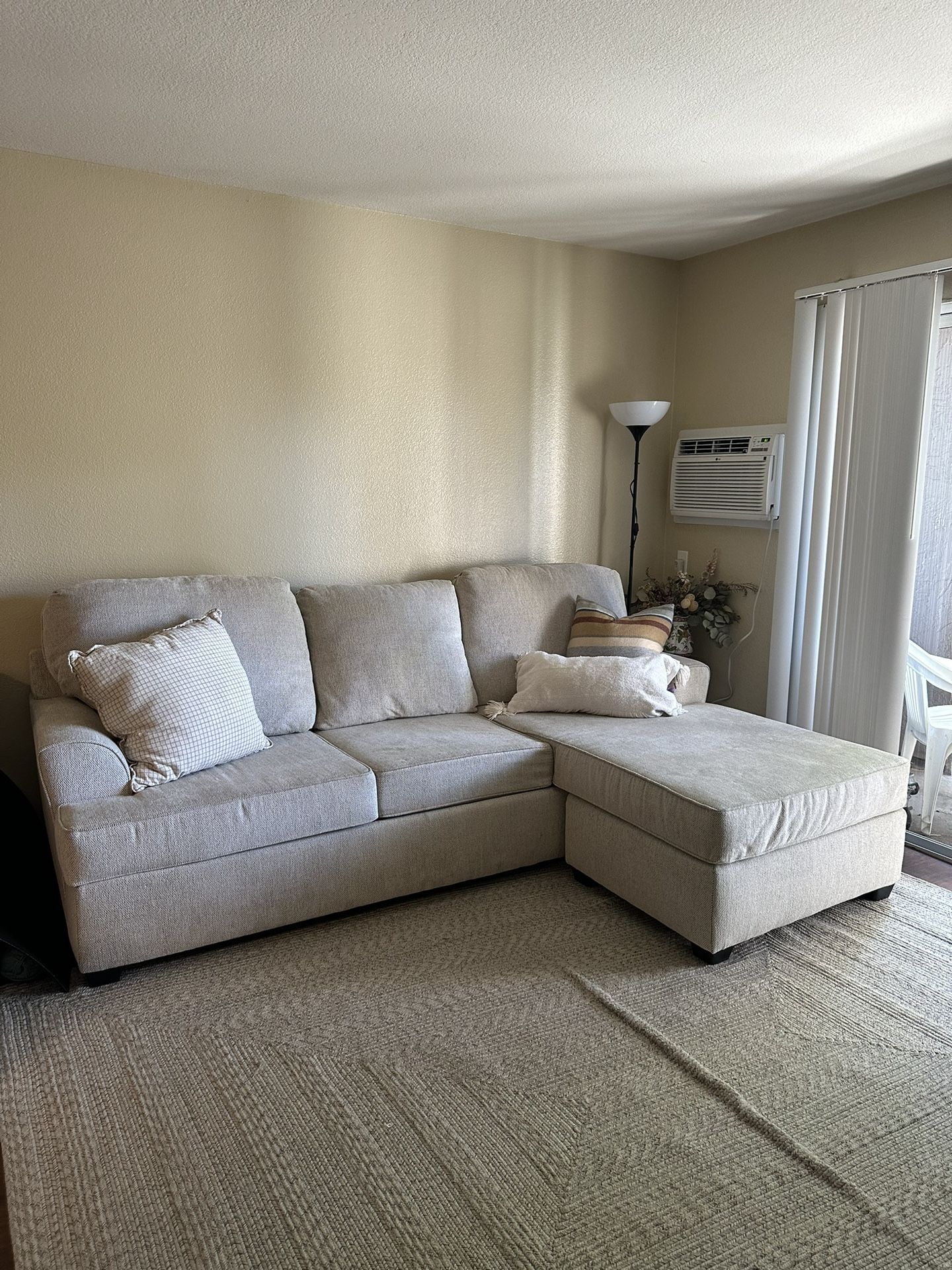 Living Spaces Alessandro Moonstone 99" Sofa With Reversible Chaise