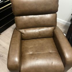 Power Recliner. Brown In Color. Faux Leather .