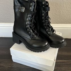 Brandnew Black Boots Size 7 Retail Value $149.99 + Tax 