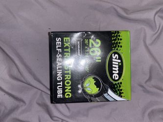 Slime 26" inner tube features pre-installed puncture sealant for self-sealing protection.