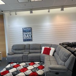 New Year Clearance Sale. Alejandra Gray Reclining Sectional Now Only $1399. Easy Finance Option. Same-Day Delivery.
