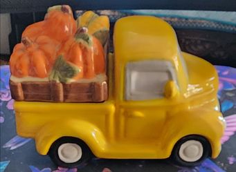 Ceramic Pick up trucks hauling pumpkins