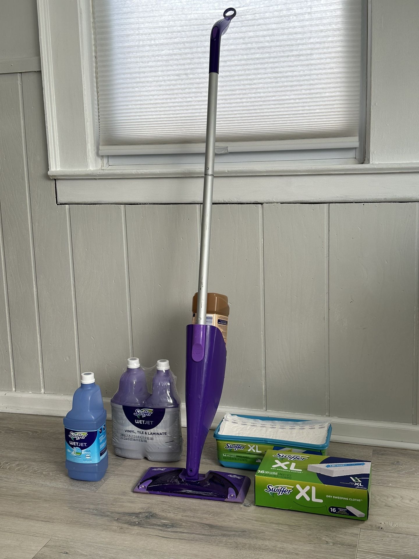 Swiffer WetJet Hardwood and Floor Spray Mop, All-in-One Mopping Kit, Includes: 1 WetJet, 10 Pads, 3 Cleaning Solution & 4 Batteries