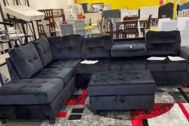 Black Fabric Reversible Sectional with Cup Holder and Storage Ottoman. Brand New.