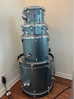PDP kick drum, low tom, high tom, snare