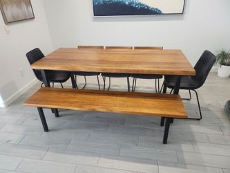 Dinning room table with chairs and bench