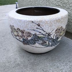 Large vintage ceramic pot with beautiful cherry blossom flowers 