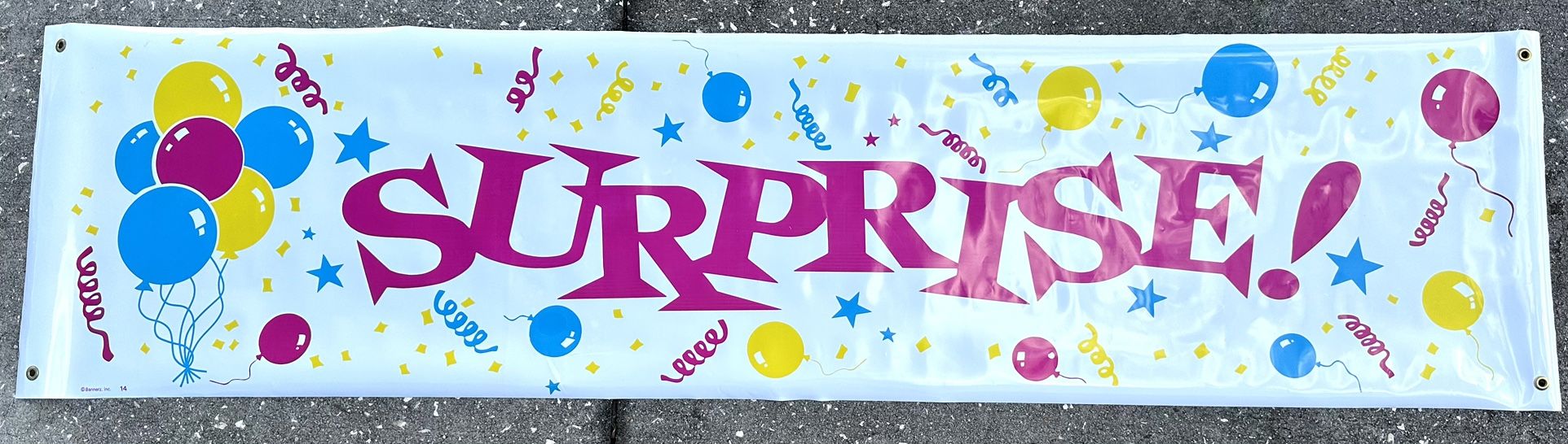 New 6 Ft X 18 “High Gloss Plastic “Surprise”.  Banner