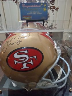 Joe Montana signed inscribed SUPER JOE helmet in display case with certificate of authenticity