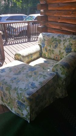 Sealy Posturepedic overstuffed chair with matching floral ottoman
