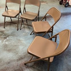 A Set Of 4 Steel Folding Chairs In Good Condition 