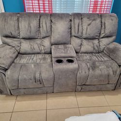 Reclining Sofa With Storage And Cup Holders